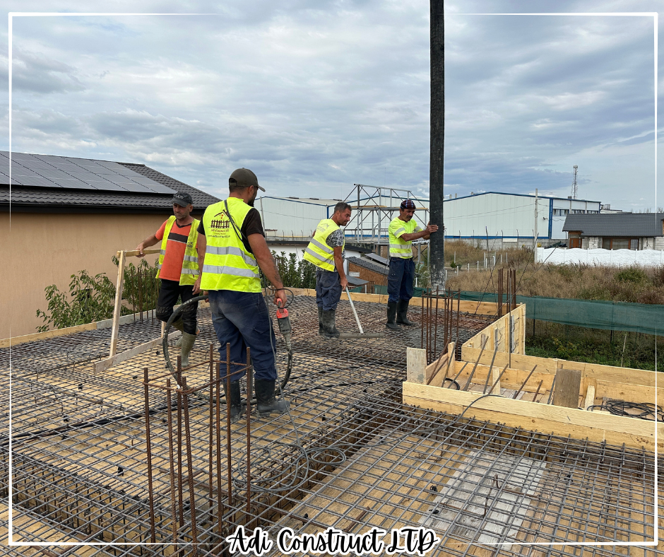 Echipa Adi Construct Ltd la turnarea unei plăci de beton